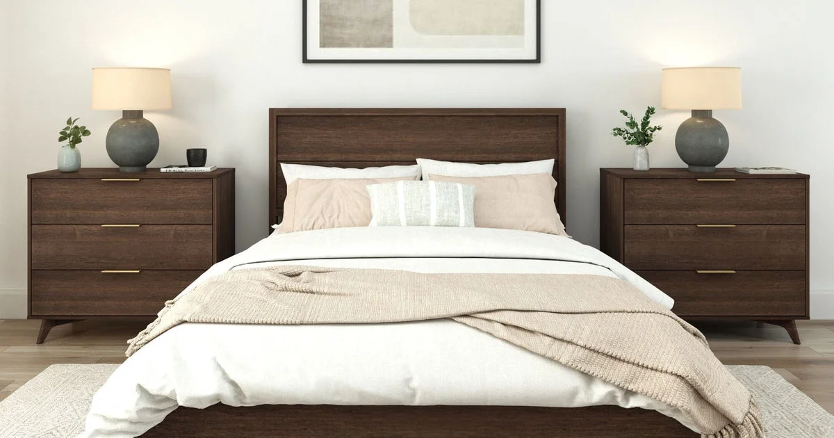 Plank+Beam Haven queen bed in a dark walnut finish with matching nightstands, featured among the 7 best wooden bed frames in 2026