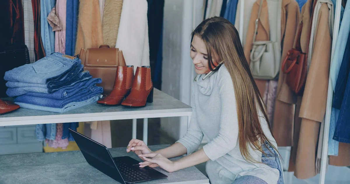 A small business owner working at a laptop in her shop, the buyer a top website builder 2026 shortlist is written for